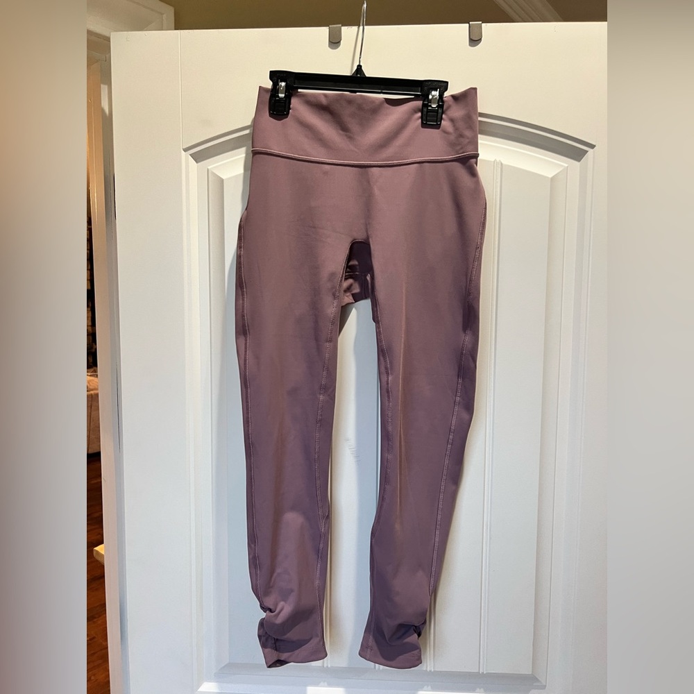 Lululemon leggings deep plum color size 6 inseam 26 cinched ankle